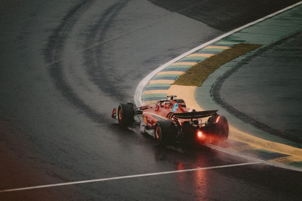 Formula 1 car taking a sharp corner on a wet track at Interlagos, illustrating the Golden Zone track-corner concept