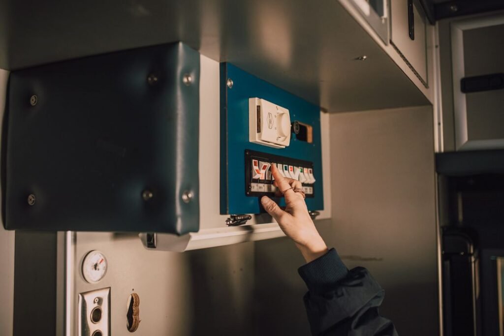 A hand flipping toggle switches on a control panel, representing the marketer's decision to opt out of automated promotions